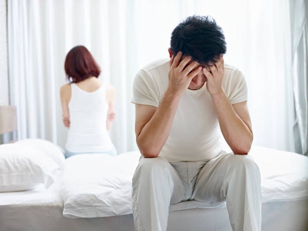 asian couple frustrated by relationship problem stock photo
