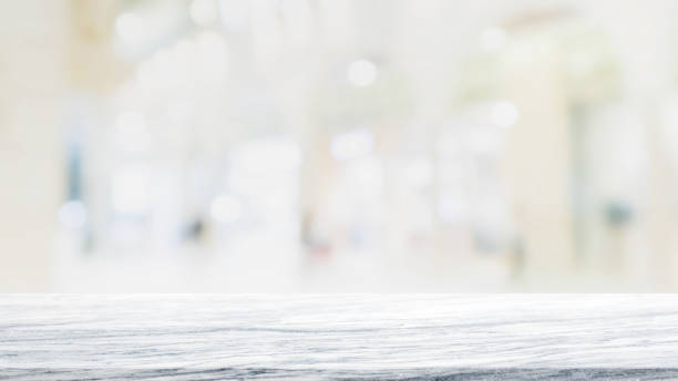 istock Stone table top on blurred with bokeh shopping mall background - can be used for display or montage your products 840113448