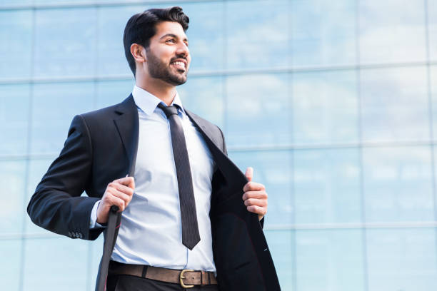 istock Arabic businessman or worker standing in suit near office building 840125178