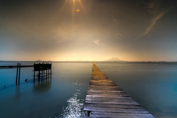 istock Wooden bridge to the sea 840128976