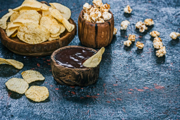 istock Potato chips served on wood 840131326