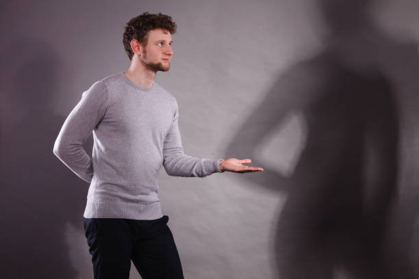 istock Man with shadow of gorgeous dancer. 840132230