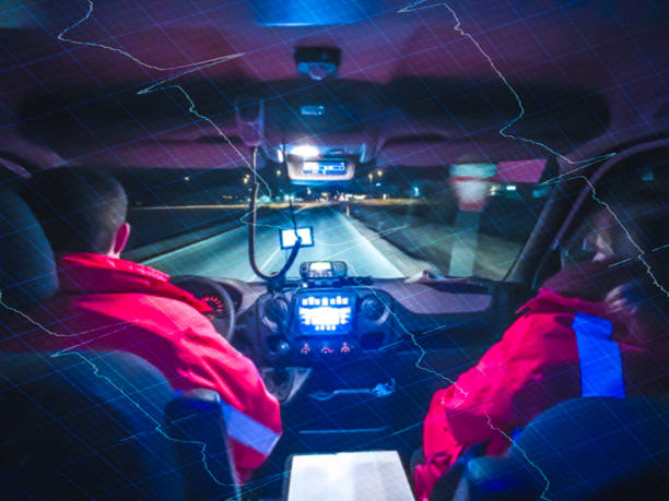 Ambulance and ECG Double exposure of a driving compartment of an ambulance and ECG. Out of focus. inside of flash stock pictures, royalty-free photos & images