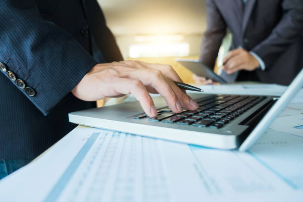istock Business man discussing with financial analyst business development strategy project and using modern digital tablet with chart on a screen,man meeting, Selective focus 840144344
