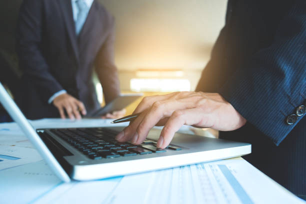 istock Business man discussing with financial analyst business development strategy project and using modern digital tablet with chart on a screen,man meeting, Selective focus 840144420