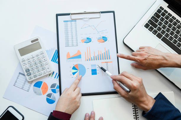 istock Business team meeting working with new startup project, discussion and analysis data the charts and graphs. Digital tablet calculator, laptop computer using, Business finances and accounting concept 840144460
