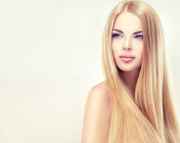 Extremely Attractive Blonde Young Blonde Haired Woman With Long  Straightshiny Hair Stock Photo - Download Image Now - iStock