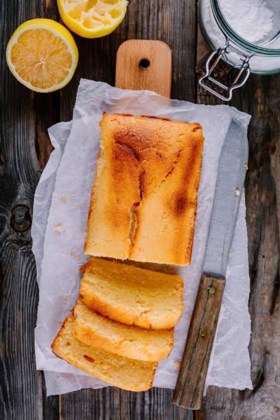 Lemon loaf cake. Top view Lemon loaf cake on wooden background. Top view pound cake stock pictures, royalty-free photos & images