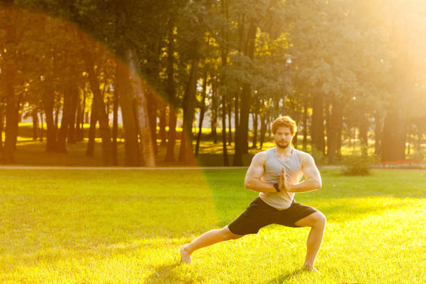 istock Sportsman doing gymnastic exercise in park. 840147776