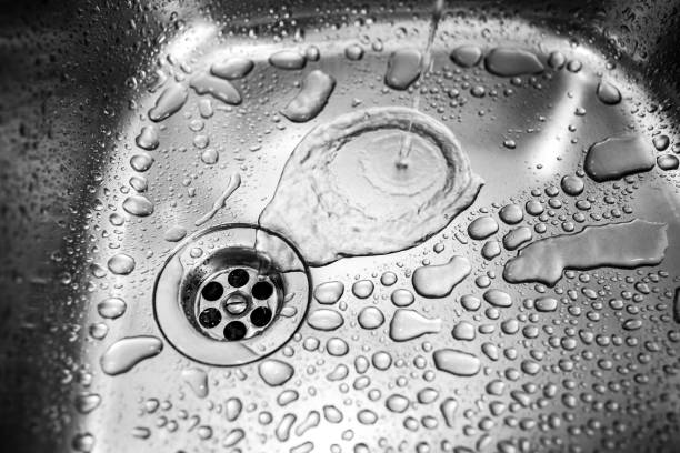 istock Yellow sponge in kitchen sink close up 840147780