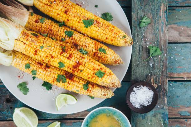 istock baked sweet corn cobs with herb butter and lime 840147964