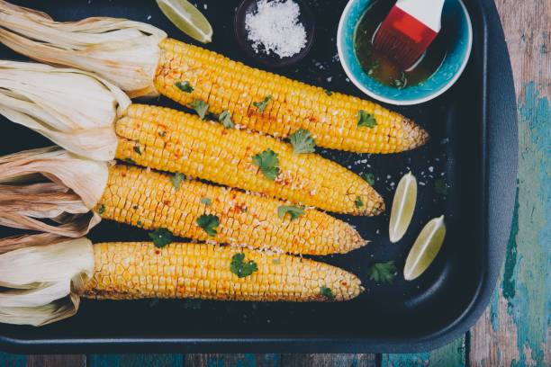 istock baked sweet corn cobs with herb butter and lime 840148016