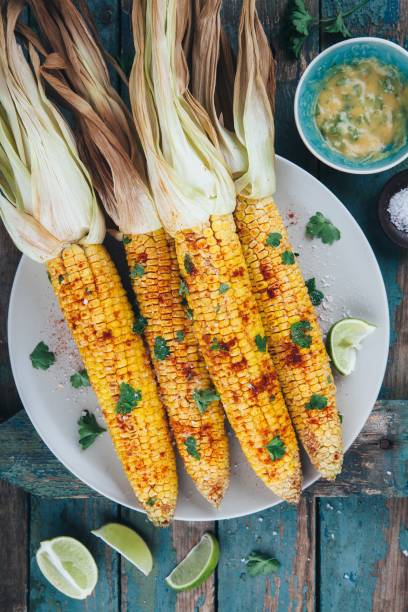 istock baked sweet corn cobs with herb butter and lime 840148090