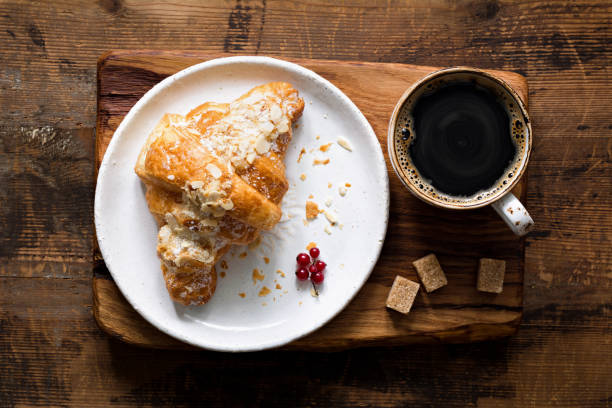istock Croissant and cup of coffee 840154100