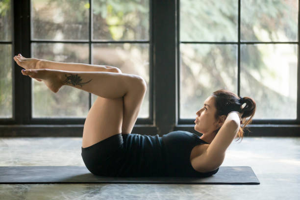 istock Young woman making Abdominal Knee Crunches for upper, lower abs 840157712
