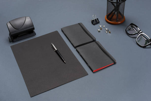 istock A set of black office accessories, glasses on gray background 840158910