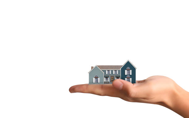 istock Mortgage concept by house from  hand 840188364