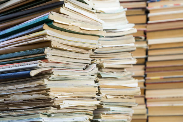 istock A stack of old school notebooks and a stack of textbooks or books 840198498