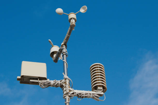 istock Weather station against an almost clear blue sky. 840198900