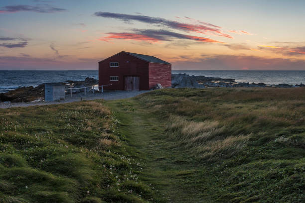 istock sunset over small fishing village 840201304
