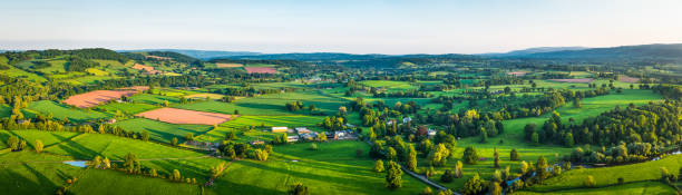 aerial panorama over patchwork pasture green summer farmland picturesque countryside - river usk imagens e fotografias de stock