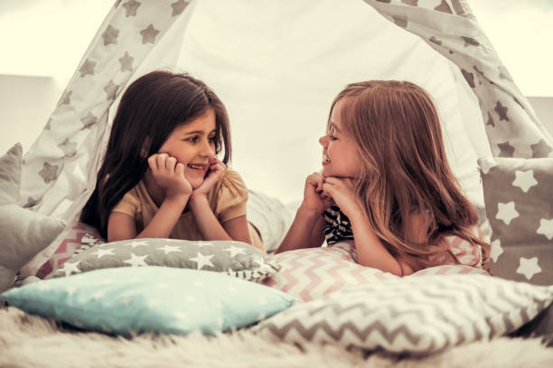 istock Little girls playing 840212536