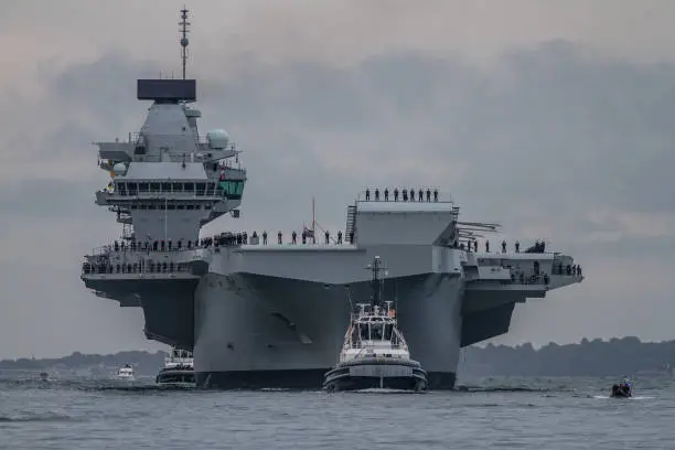 Supercarrier or warship  arrives in Portsmouth for the first time.
