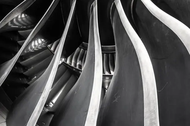 June 25 2016, Abu Dhabi, UAE. Closeup of the Boeing 777 engine. The fan blades in the front and compression intake in the background