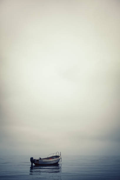 istock Lonely boat in calm water in the harbor 840216314