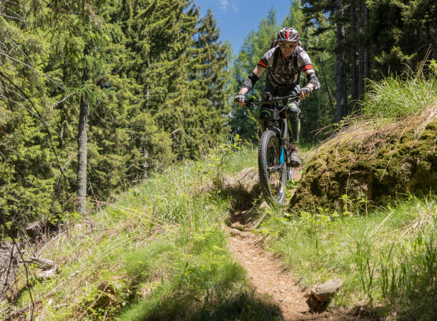 istock Experienced electric mountainbiker on a footpath, Austria. 840216972