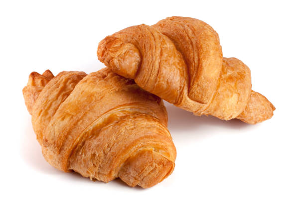 istock two croissant isolated on white background closeup 840223196