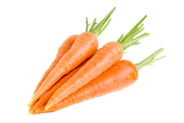 istock Carrot vegetable with leaves isolated on white background 840223970