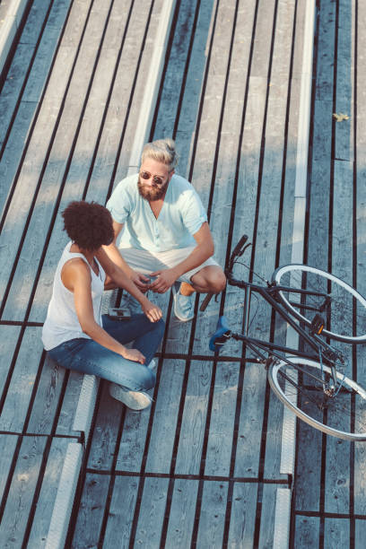 https://media.istockphoto.com/id/840230982/photo/young-couple-at-riverbank.jpg?b=1&s=170667a&w=0&k=20&c=naTeBOdbiFKjLcfps7rCEJgpon-WY4Wp34Wh1kxPkBY=