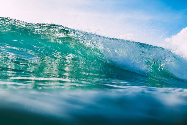 istock Blue wave in ocean. Crystal wave and sun light 840237058