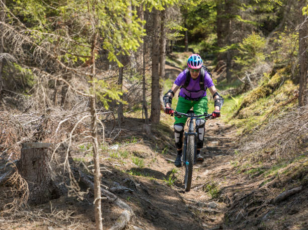istock Colorful dressed mountainbiker in the Carinthian forests, Austria. 840240892