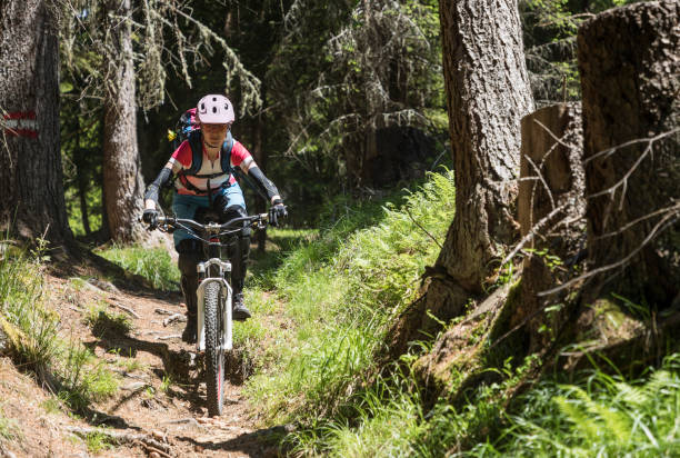 istock Smiling female mountainbiker in Carinthian forests, Austria. 840241218