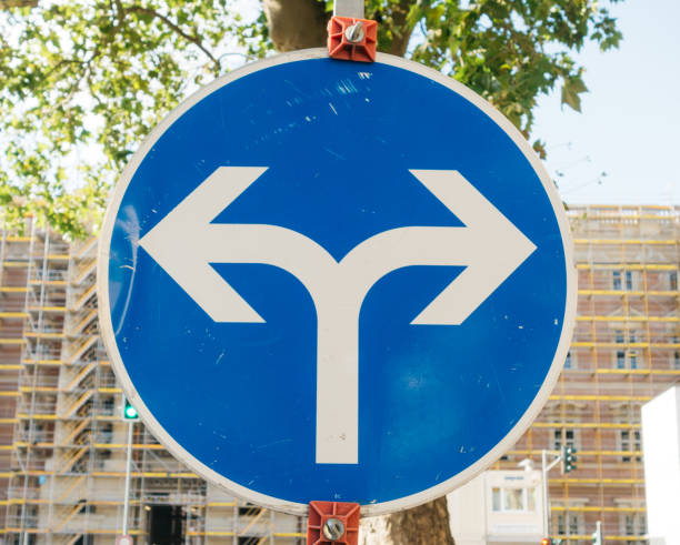 istock arrow sign with two directions 840241562
