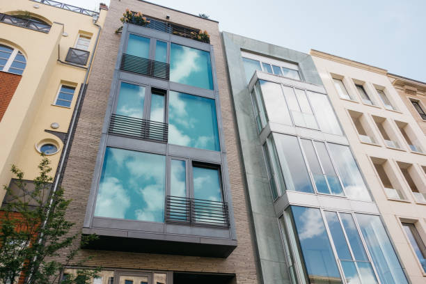 istock modern townhouse with big glass facade 840247272