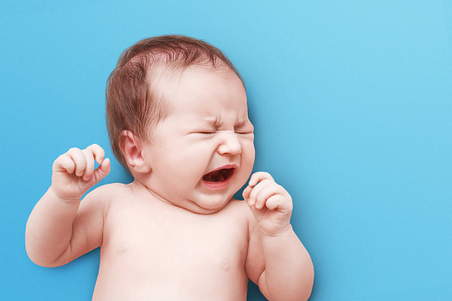 newborn baby crying. Baby's portrait