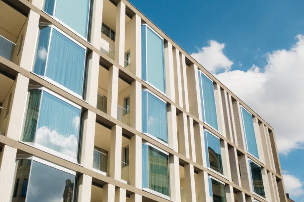 istock colorful office building with marble facade and big glass facade 840247698