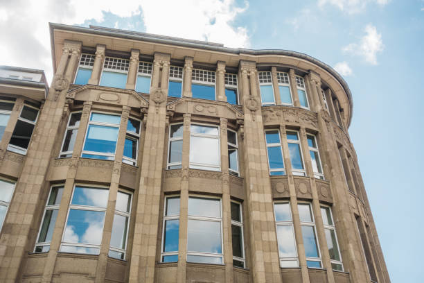 istock beautiful brown facaded real estate building with blue windows 840265618