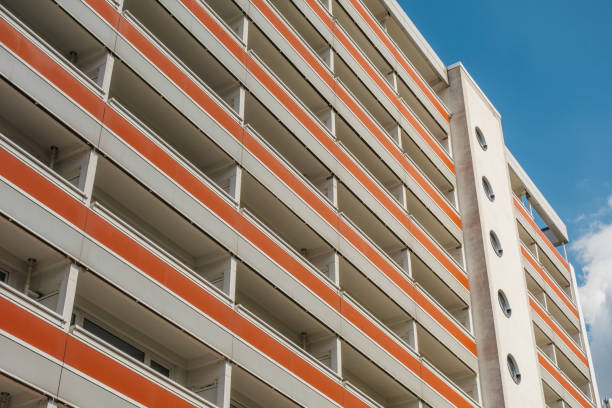 istock apartment block with red balconies in lines 840266454