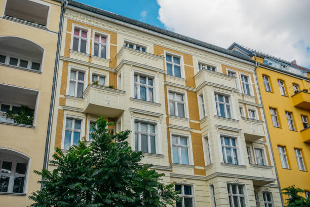 istock brown and yellow buildings in a row at berlin 840266632