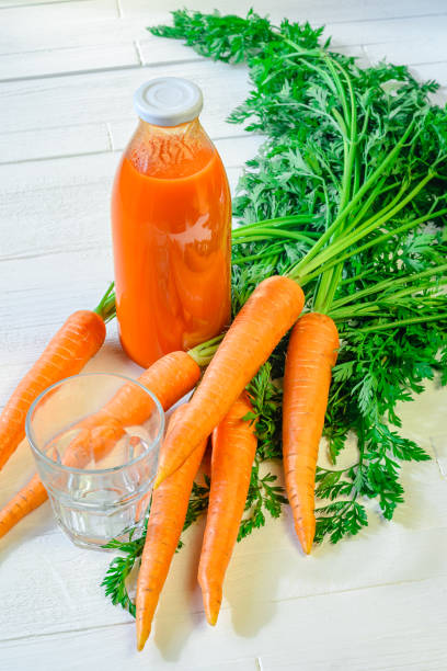 istock Carrot juice still life 840276312