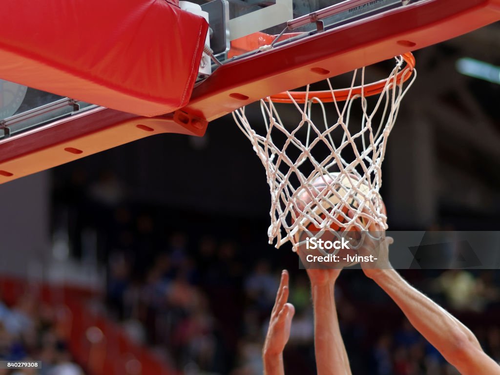Basketball match Fight under the backboard during a basketball match Basketball - Sport Stock Photo
