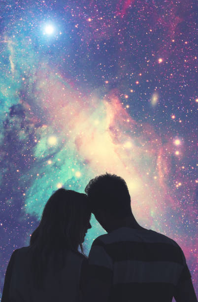 Silhouettes of a young couple under the starry sky. My astronomy work. Silhouettes of a young couple under the starry sky. My astronomy work. stars in your eyes stock pictures, royalty-free photos & images