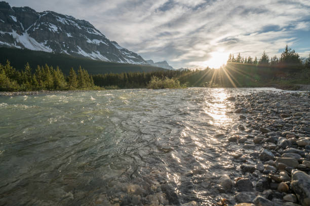 istock River and Canadian Rockies at sunset 840283222
