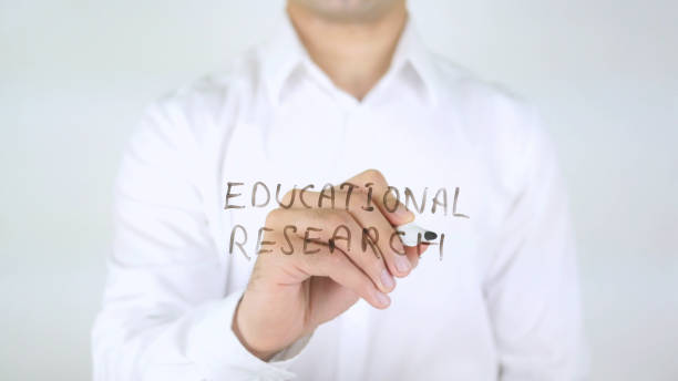istock Educational Research, Man Writing on Glass 840286450