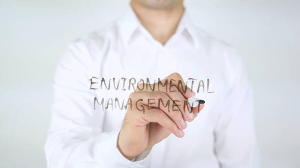 istock Environmental Management, Man Writing on Glass 840286556