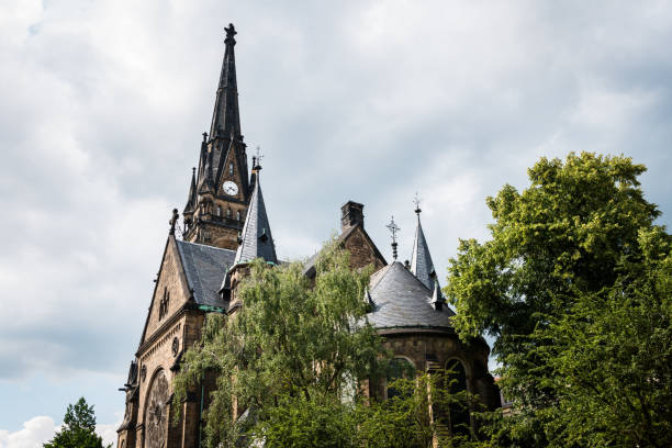 Tower of Martin Luther church (ca. 1883) against a cloudy sky in Dresden, Germany.